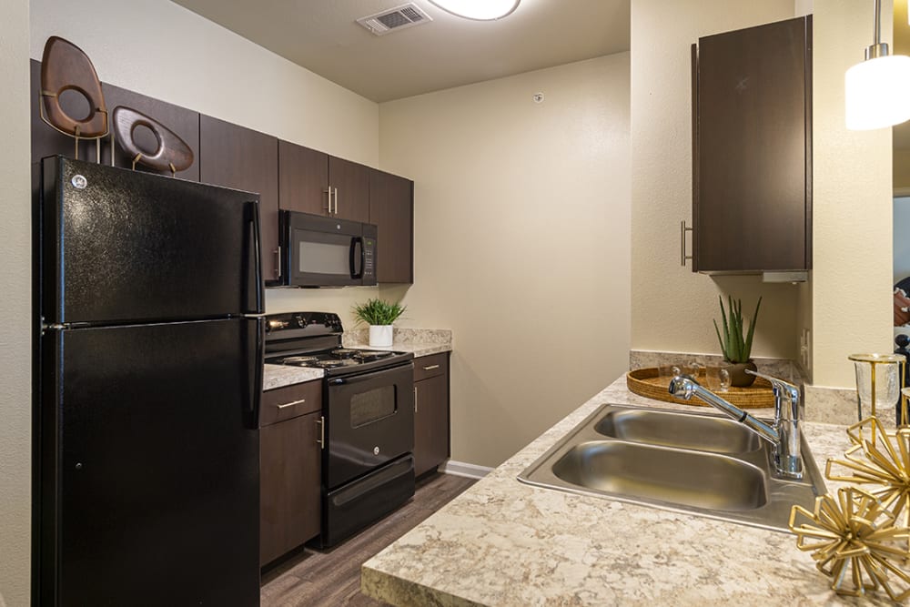 Apartment kitchen at Brazos Crossing in Richwood, Texas