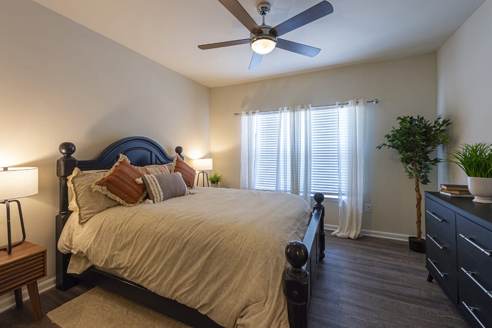 Model apartment bedroom at Brazos Crossing in Richwood, Texas