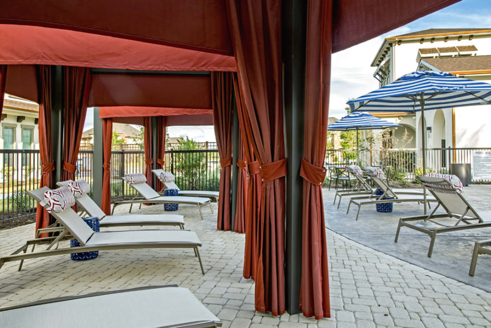 covered poolside seating at The Standard at EastPoint in Baytown, Texas