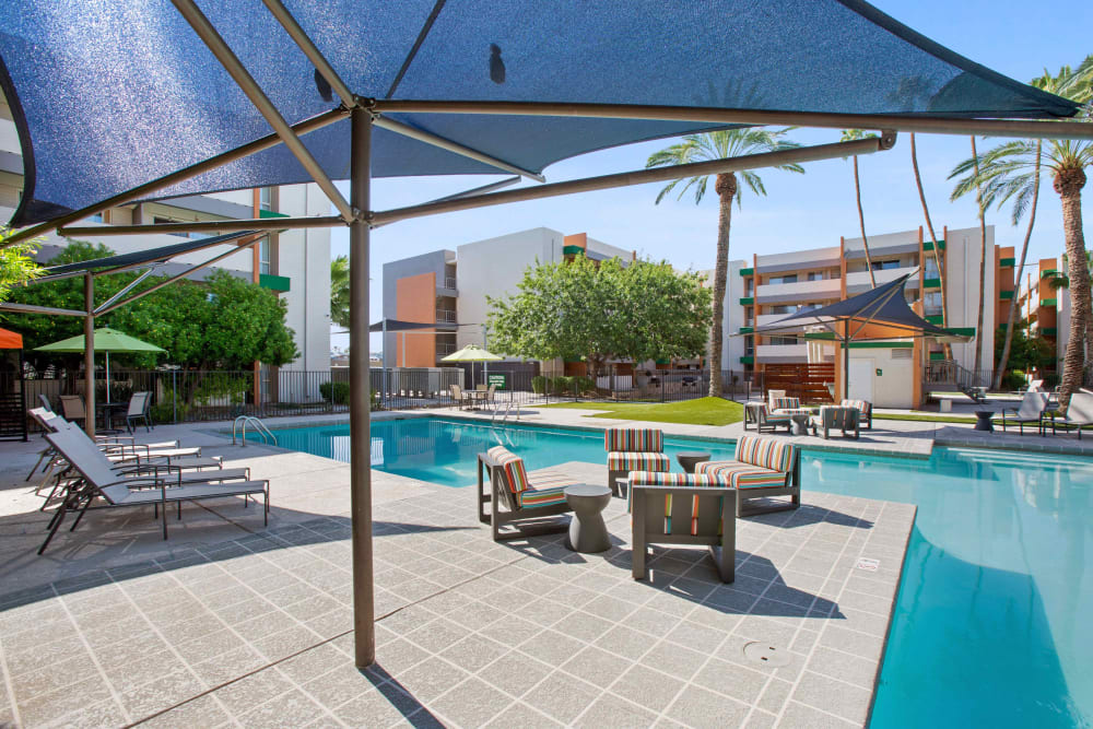 Swimming pool with cover from the sun at Capri On Camelback in Phoenix, Arizona
