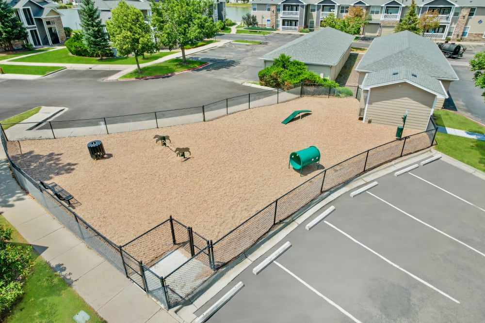 Have fun with your furry friend in the dog park at Gateway Park Apartments in Denver, Colorado