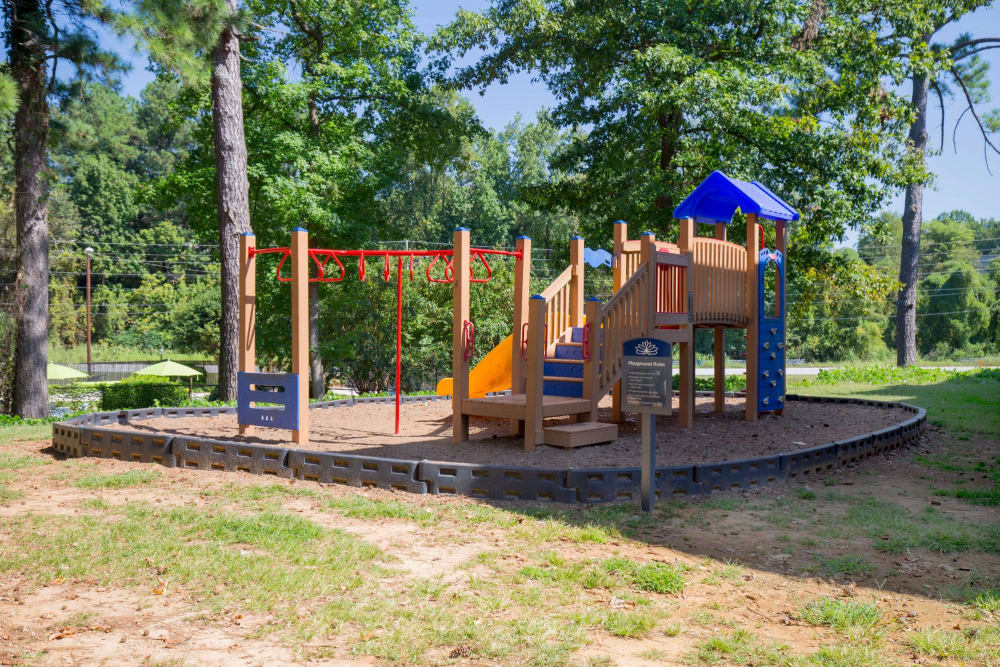Modern playground with plenty of room for kids at Avondale Reserve Apartment Homes in Avondale Estates, Georgia
