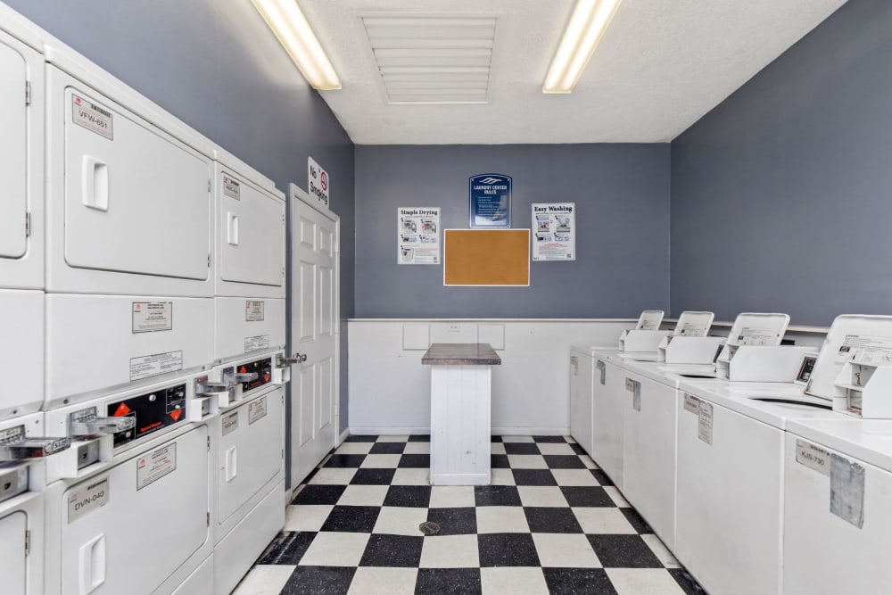 Community laundry facility at Carriage Hills Apartments in Macon, Georgia