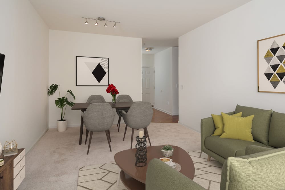 Open concept living room and dining in a model apartment home at The Brunswick in New Brunswick, New Jersey