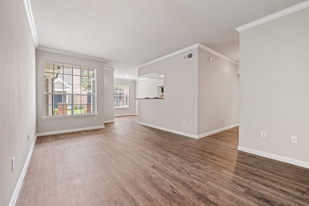 Open floor plan with wood floors at Marquis at Westchase in Houston, Texas