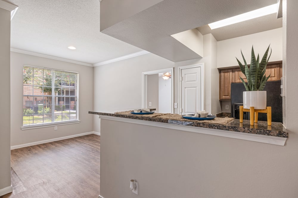 Kitchen and adjacent dining area at Marquis at Westchase in Houston, Texas