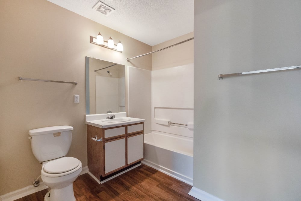 Bathroom with nice flooring at The Cove at Cloud Springs Apartment Homes in Fort Oglethorpe, Georgia
