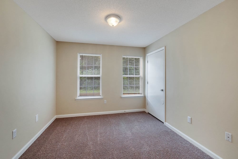 Bedroom with natural light at The Cove at Cloud Springs Apartment Homes in Fort Oglethorpe, Georgia