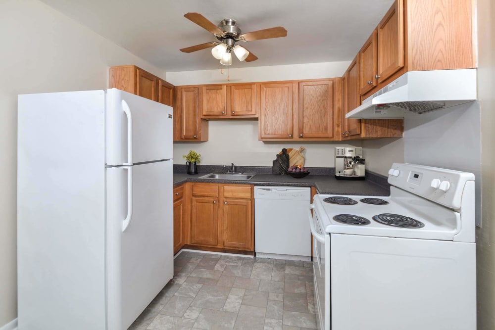 Kitchen with white appliance at Harborstone in Newport News, Virginia
