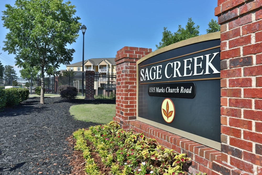 Welcome sign at Sage Creek Apartments in Augusta, Georgia