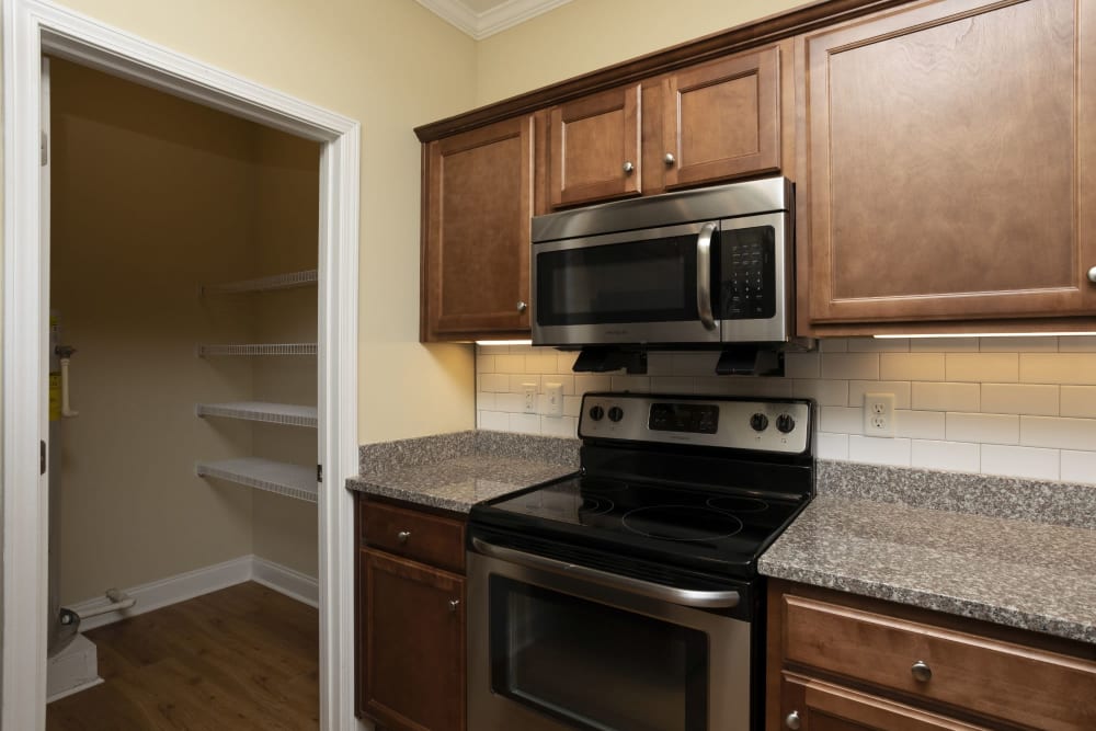 Kitchen with new appliances at Sage Creek Apartments in Augusta, Georgia