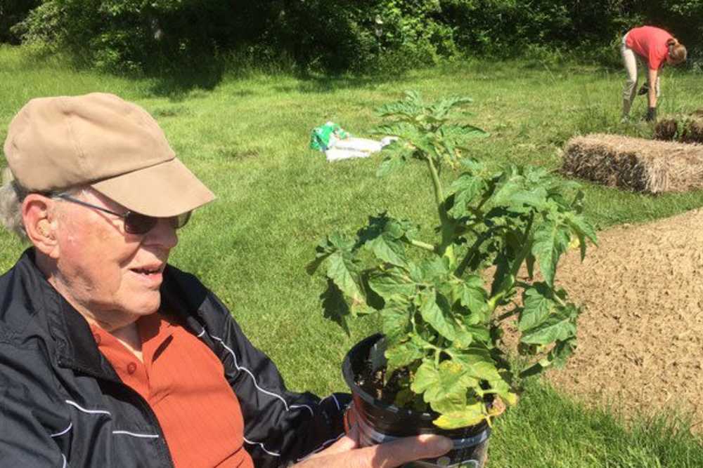 Resident gardening at Corp Site Testing in Bend, Oregon
