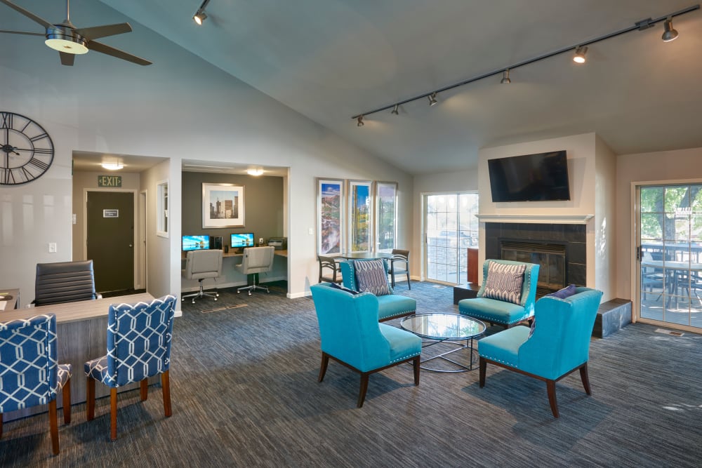 Community clubhouse kitchen and seating at Bluesky Landing Apartments in Lakewood, Colorado