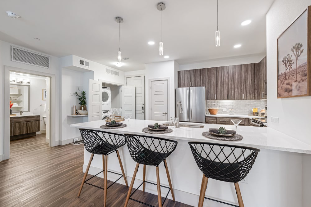 Kitchen with modern features at Marquis at Chandler in Chandler, Arizona