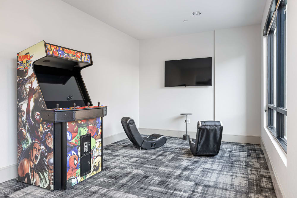 Arcade game and setup for console gaming at Marquis at Chandler in Chandler, Arizona