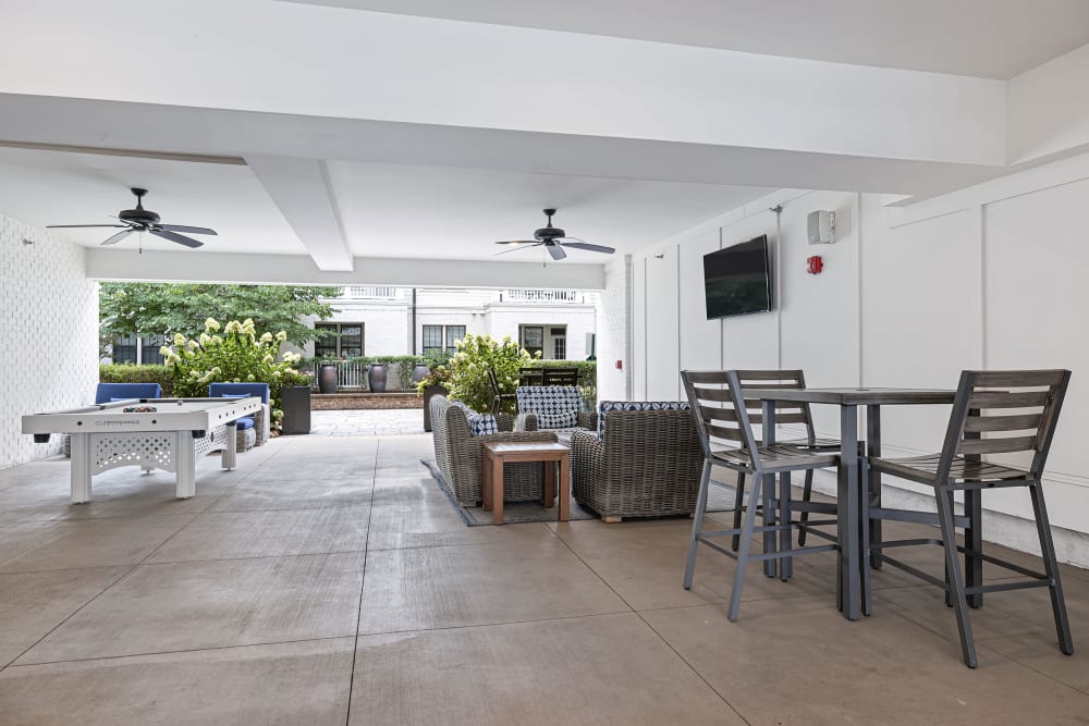 Covered outdoor entertainment area at Marquis at Buckhead in Atlanta, Georgia