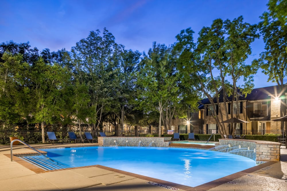 Evening view of pool at Marquis at Westchase in Houston, Texas