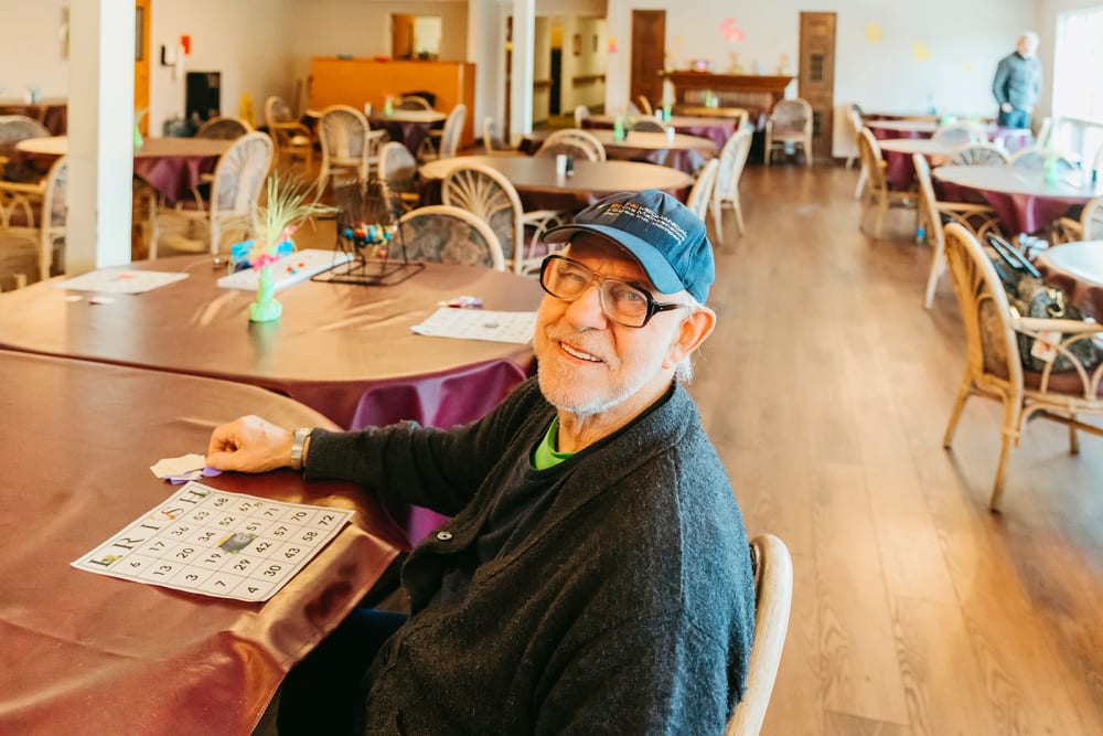 Resident playing scrabble at 6th Ave Senior Living in Tacoma, Washington
