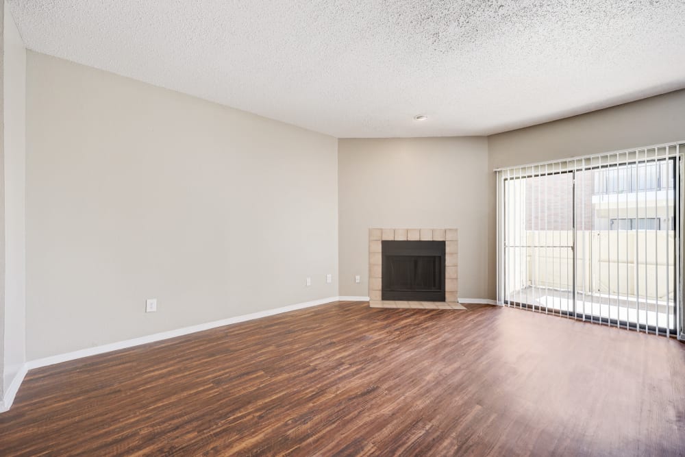 living room and fireplace at Summit Point Apartments in Mesquite, Texas