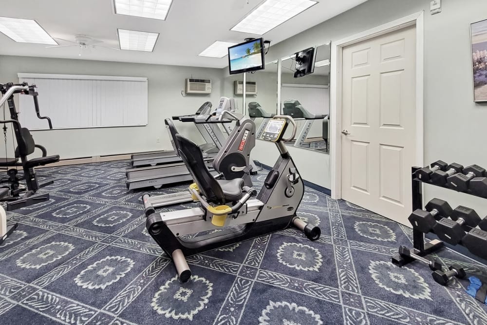 Well-equipped fitness center with cardio equipment at Maiden Bridge & Canongate Apartments in Pittsburgh, Pennsylvania