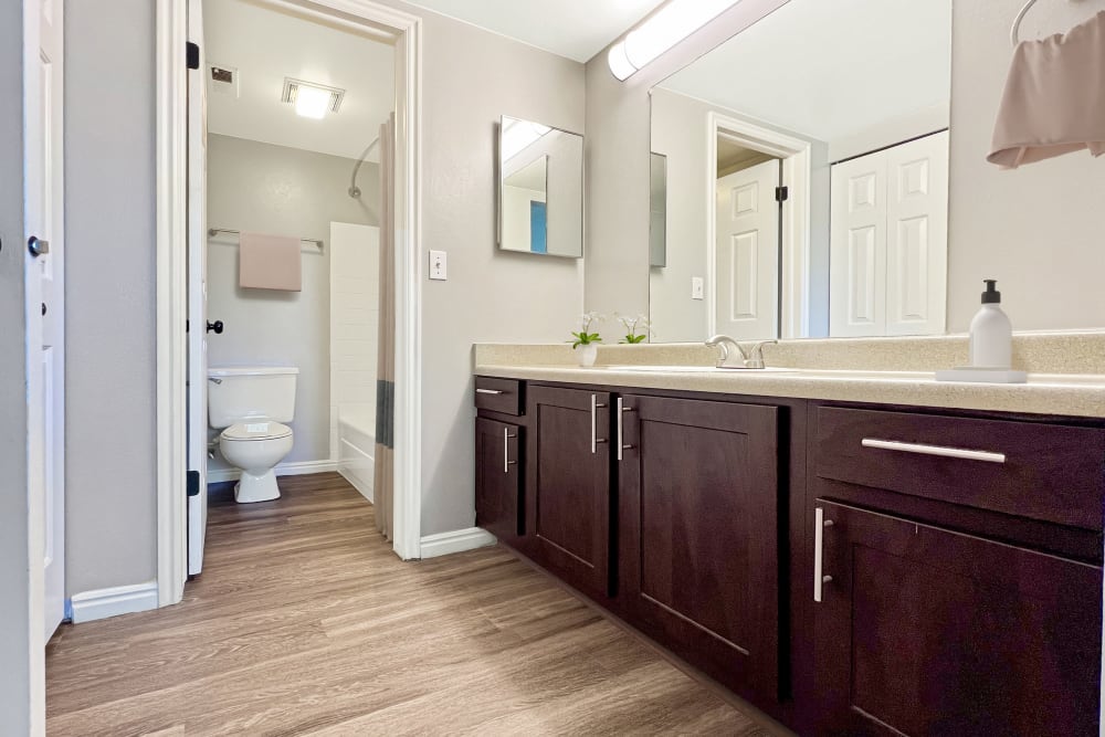 Large bathroom vanity with ample counter space at Royal Farms Apartments in Salt Lake City, Utah