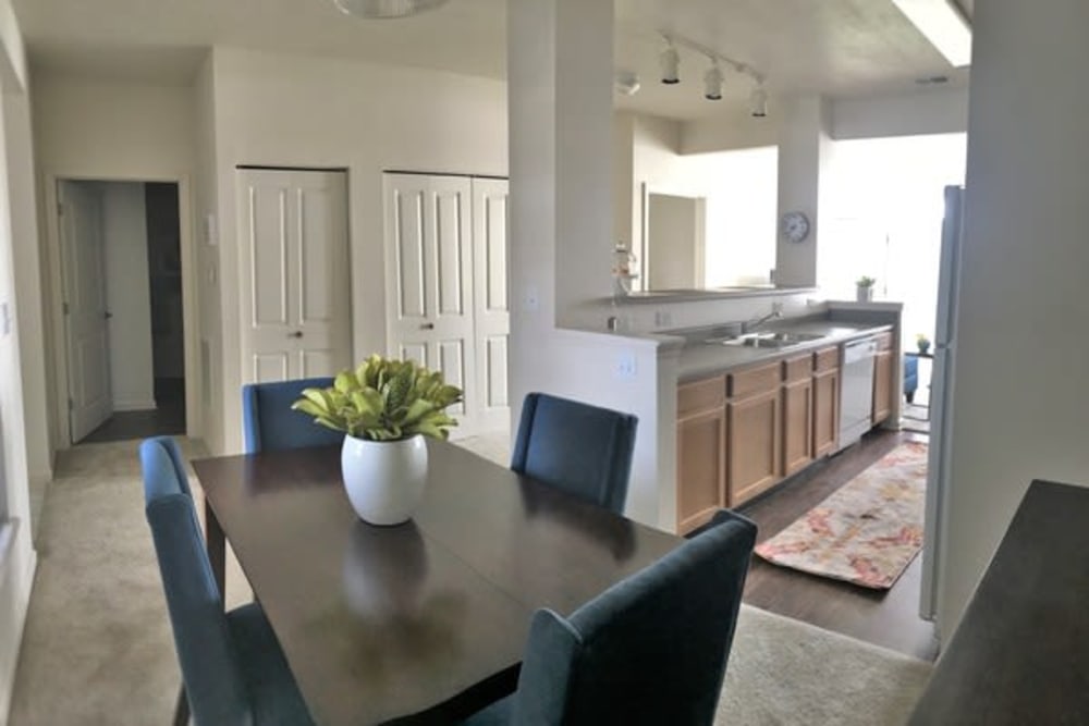 Resident dinning room with easy access to kitchen at Lakeshore Apartment Homes in Evansville, Indiana
