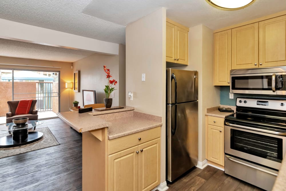 Model apartment with wood-style flooring at Colter Park, Phoenix, Arizona