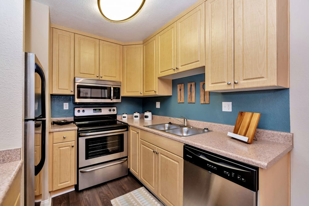 Kitchen with stainless-steel appliances at Colter Park, Phoenix, Arizona