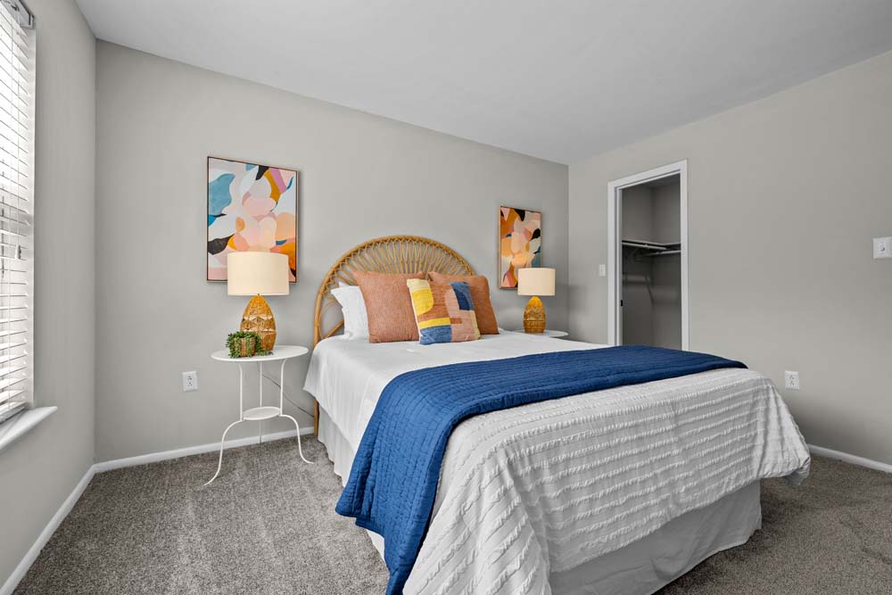 Well lit model bedroom at Runaway Bay Apartments in Virginia Beach, Virginia