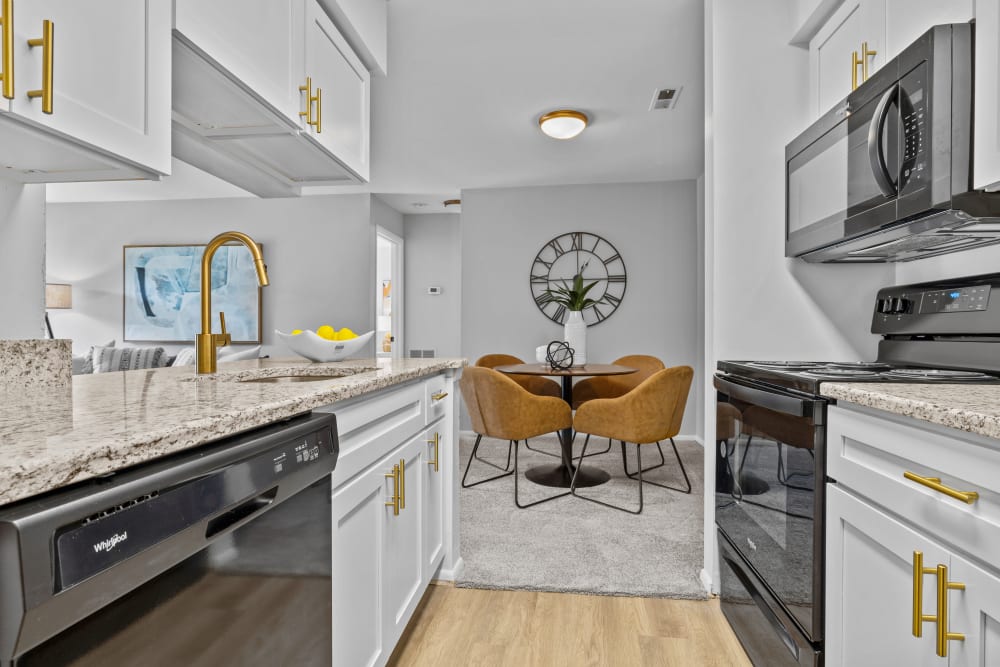 Open floor plan with kitchen at Runaway Bay Apartments in Virginia Beach, Virginia