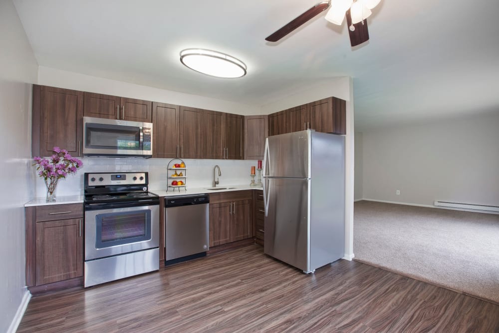 renovated kitchen with wood style flooring and stainless-steel appliances at Valley Park in Bethlehem, Pennsylvania