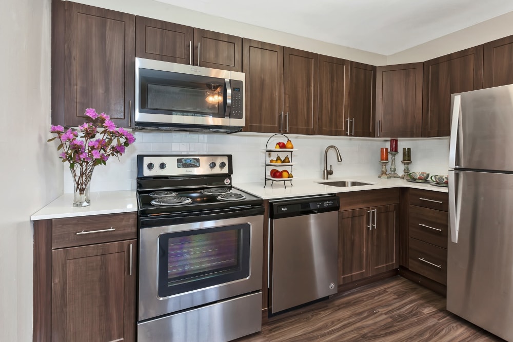 Model kitchen with wood style flooring at Valley Park in Bethlehem, Pennsylvania