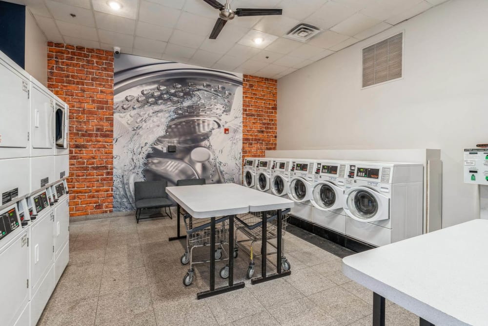 Laundry room at Parc at Lyndhurst in Lyndhurst, New Jersey