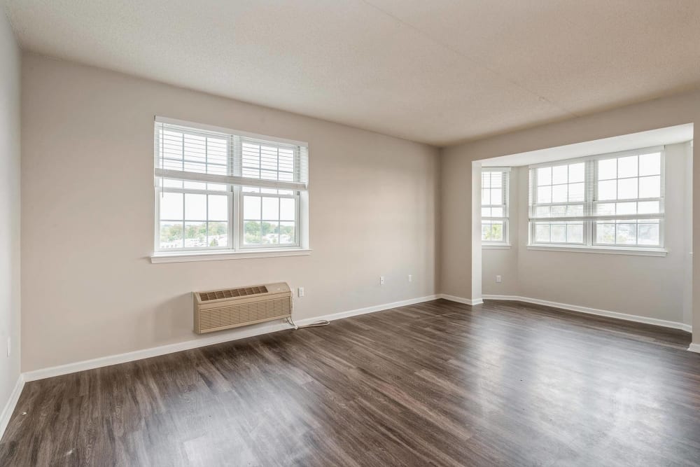 Spacious living room with wood flooring at Parc at Lyndhurst in Lyndhurst, New Jersey