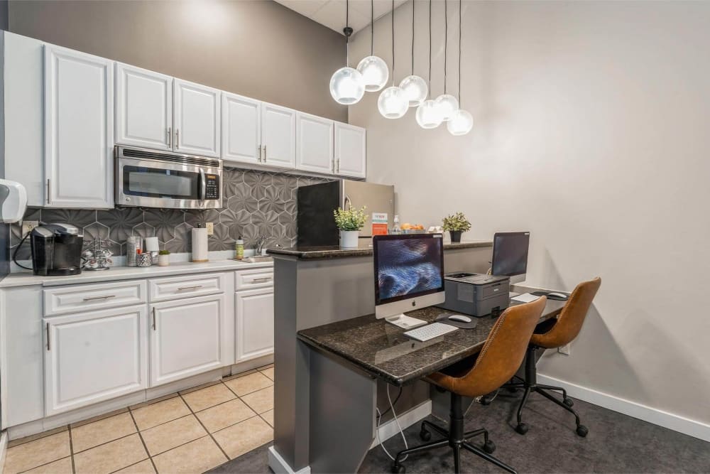 Business center and kitchen at Parc at Lyndhurst in Lyndhurst, New Jersey