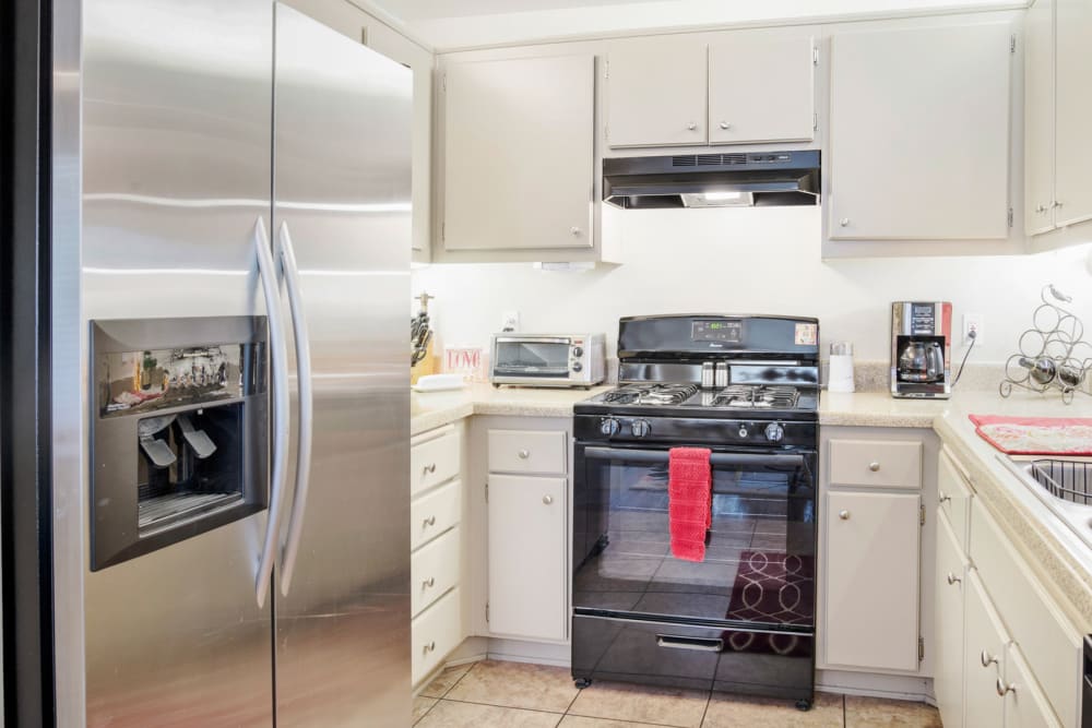 Kitchen at Woodpark Apartments in Aliso Viejo, California