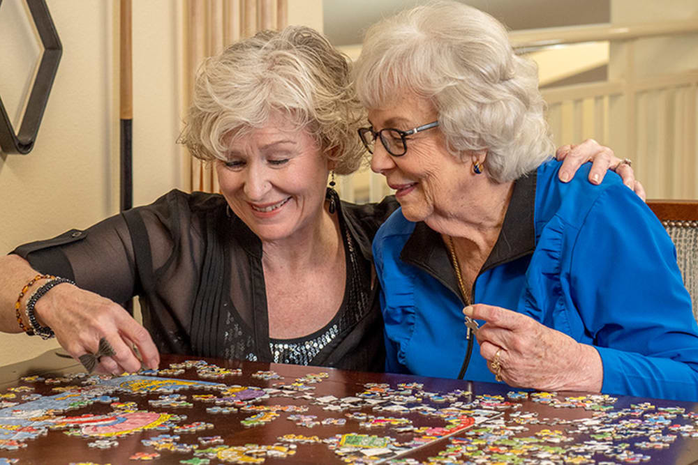  Residents building puzzle at Victoria Park Personal Care Community in Regina, Saskatchewan