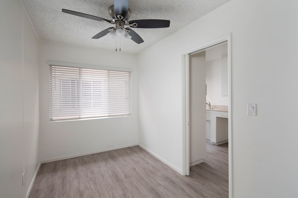 Apartment with ceiling fan at Emerald Manor Apartments in San Diego, California