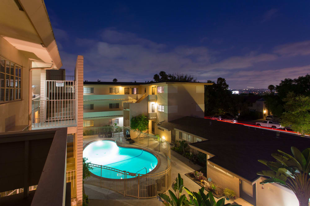 Beautiful pool at night Emerald Manor Apartments in San Diego, California