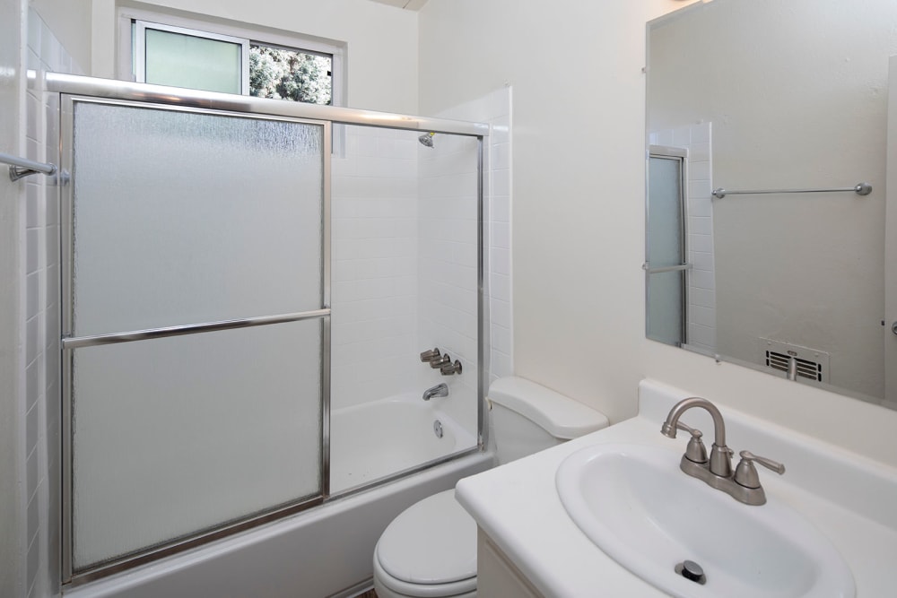 All white bathroom at Sail Bay Apartments in San Diego, California