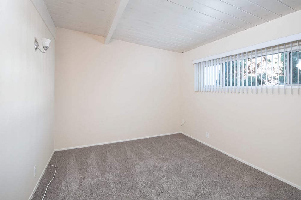 Carpeted room in apartment at Sail Bay Apartments in San Diego, California