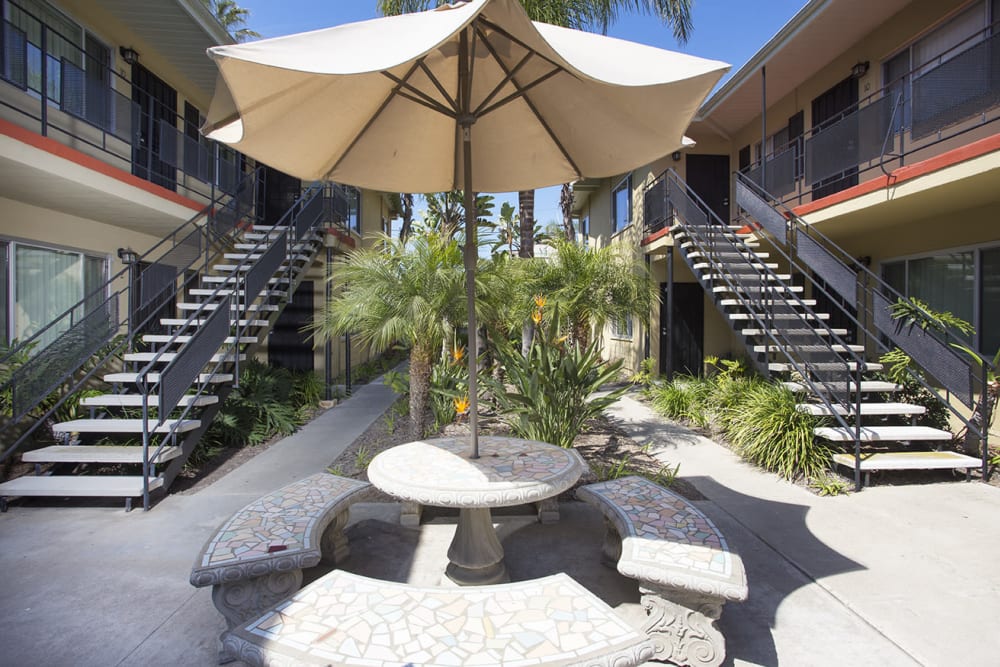 Table and umbrella at Sail Bay Apartments in San Diego, California