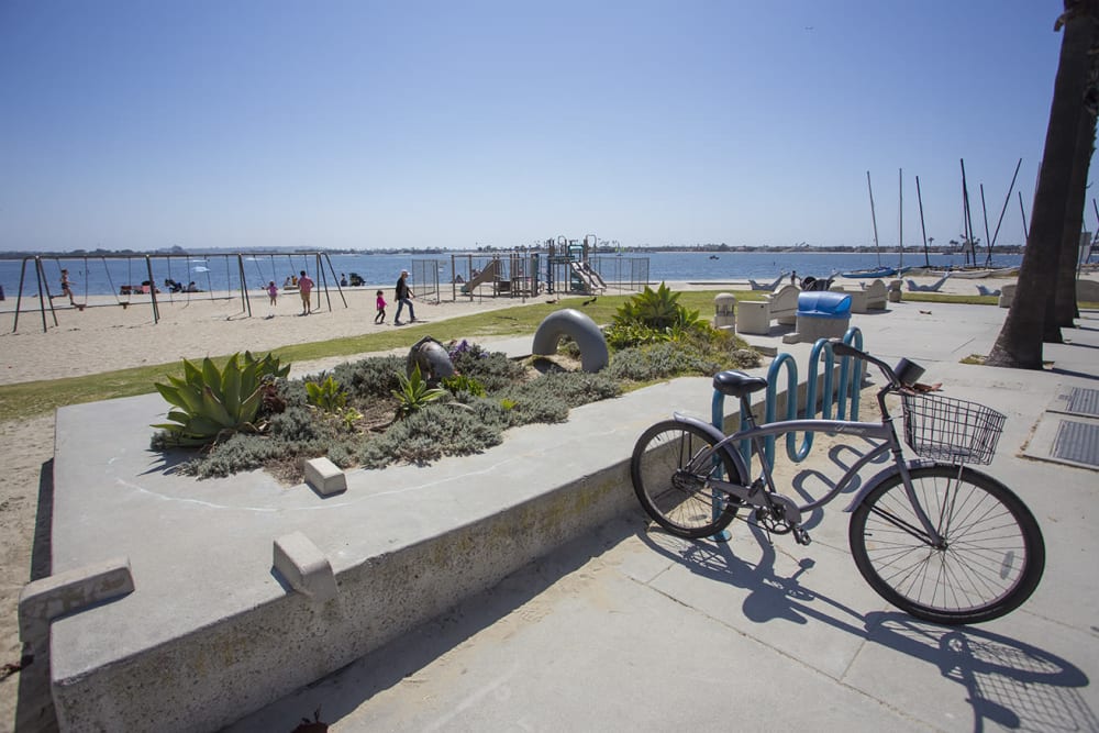 Beach with a bicycle near Sail Bay Apartments in San Diego, California