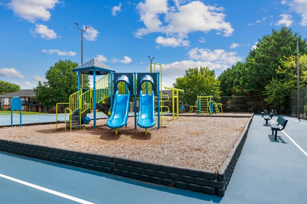 Apartments with a Playground equipped with a slide located at King's Manor Apartments in Harrisburg, Pennsylvania