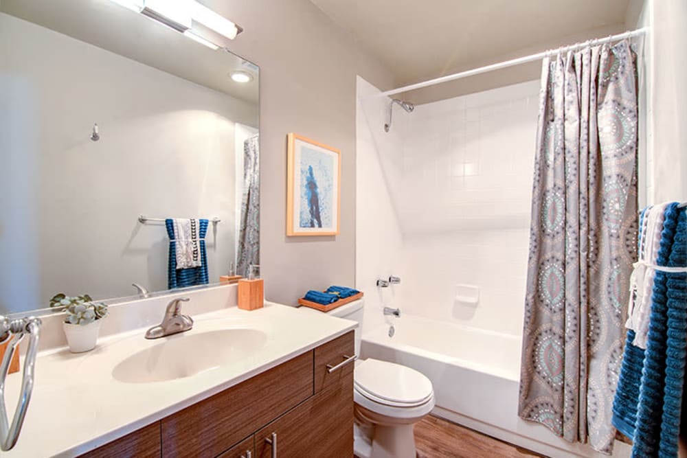 Bathroom with white counters at Villas at Carlsbad in Carlsbad, California