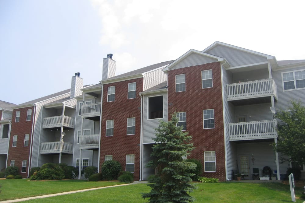Exterior view of balconies and patios at Meridian Oaks Apartments in Greenwood, Indiana