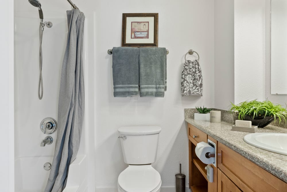 Resident bathroom with shower at Pacifica Senior Living Burlingame in Burlingame, California