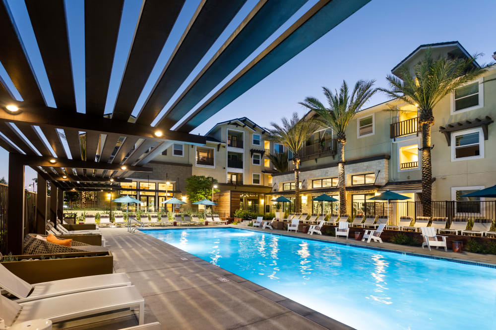 Swimming pool at night at The Residences at Escaya in Chula Vista, California