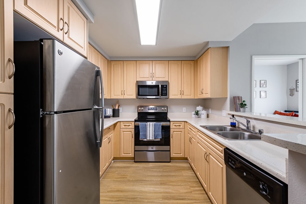 Gourmet kitchen with stainless-steel appliances at K Street Flats Apartment Homes in Berkeley, California