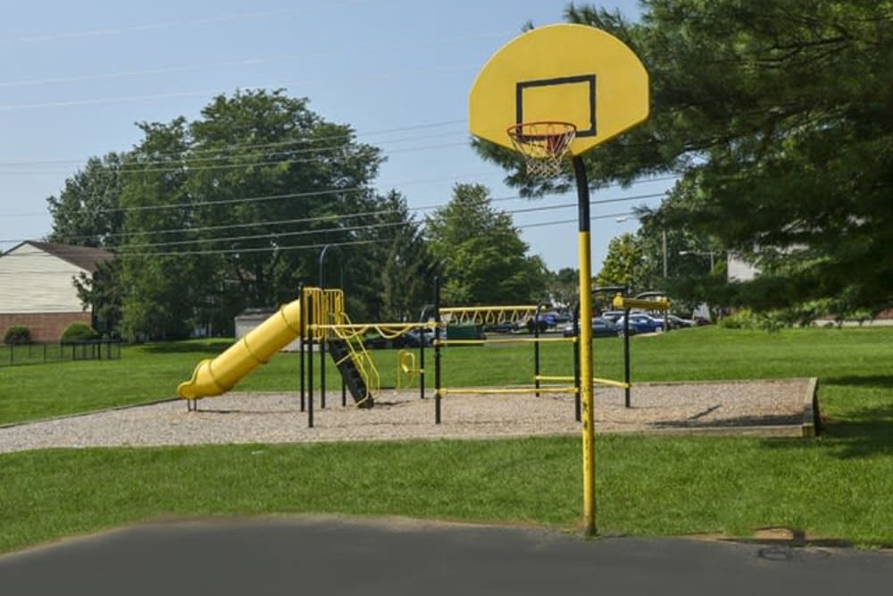 Basketball court by the playground at River Pointe in Bethlehem, Pennsylvania